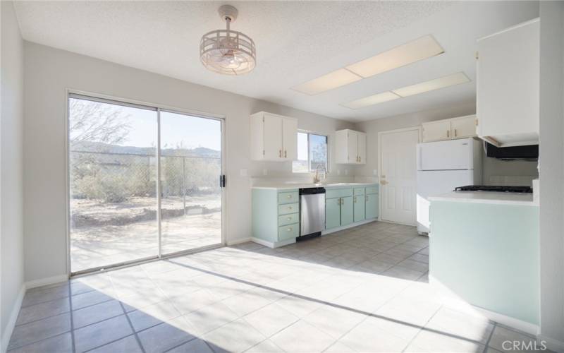 Dining area opens to the kitchen