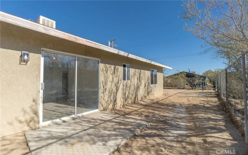 Sliding glass door and patio slab