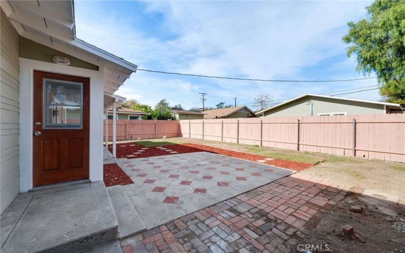 Back door out to back yard and covered patio