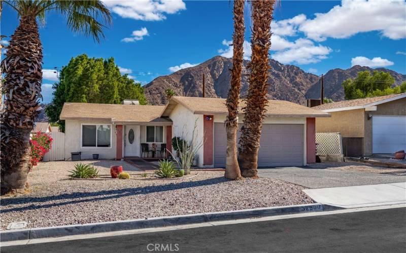 Front of home with low maintenance landscaping.