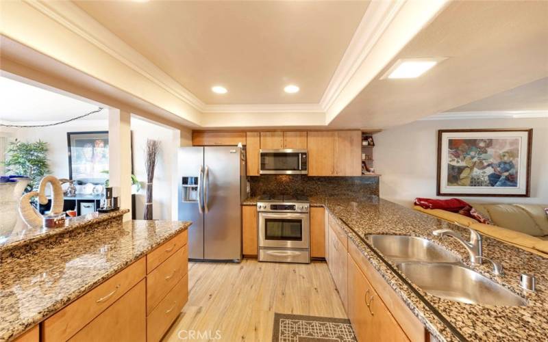 Beautiful kitchen with stainless steel appliances. It is open to all living spaces making it a great home to entertain.