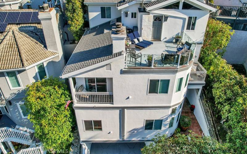 Aerial showing spacious rooftop deck.