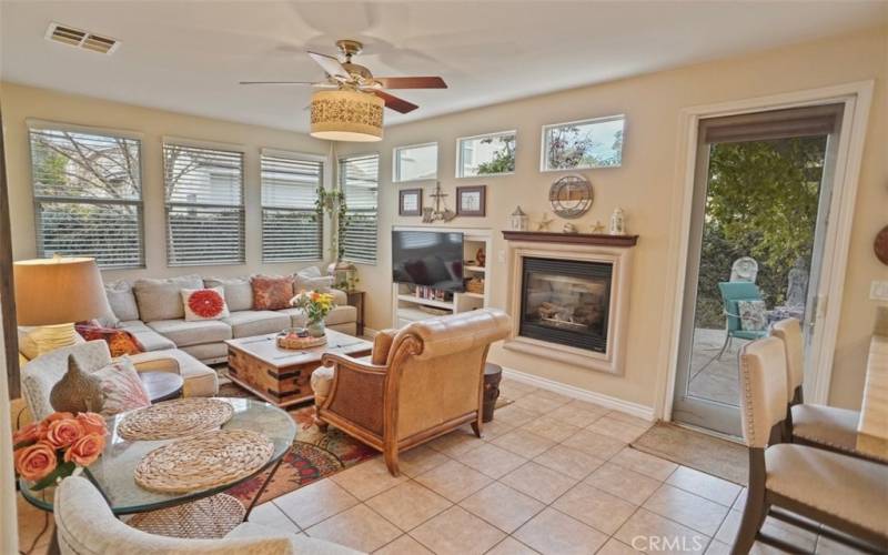 Family room with direct access to charming backyard