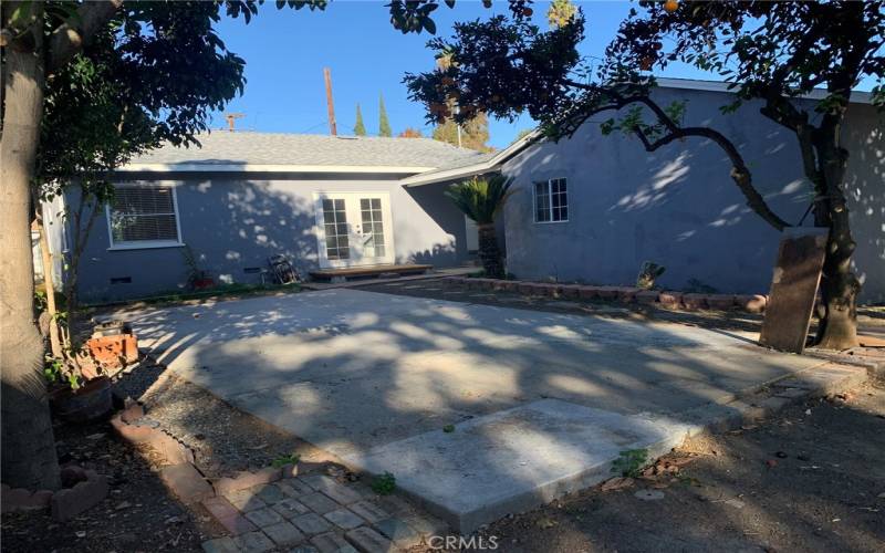 large backyard with gate  plenty of space for cars, RV's even trucks.
