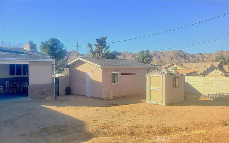 2-CAR DETACHED GARAGE AND A STORAGE SHED.