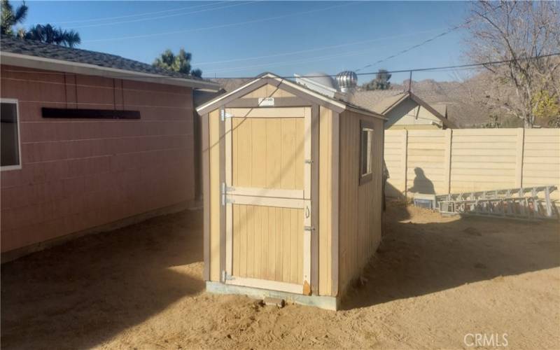 STORAGE SHED.  THERE ARE 2 IN THE PROPERTY IN ADDITION TO THE GARAGE.