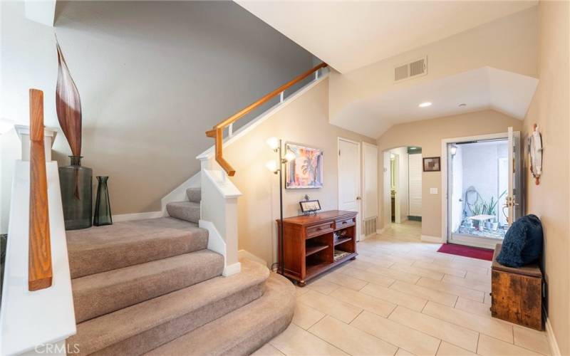 Wide Entryway and cascading staircase