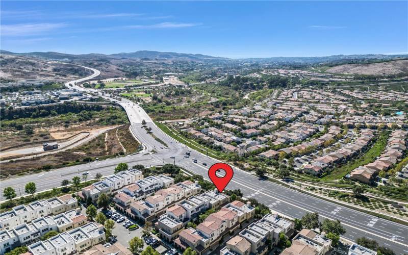 Aerial view of condo and community.