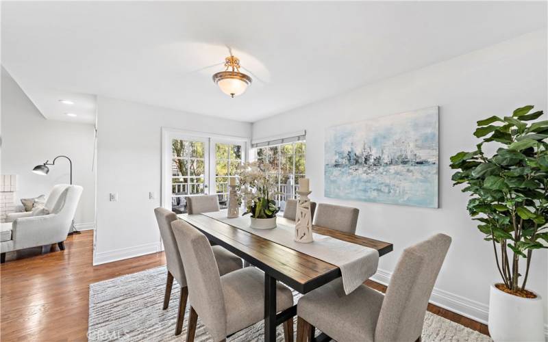 Formal Dining room with french doors beyond that lead out to an outside deck.