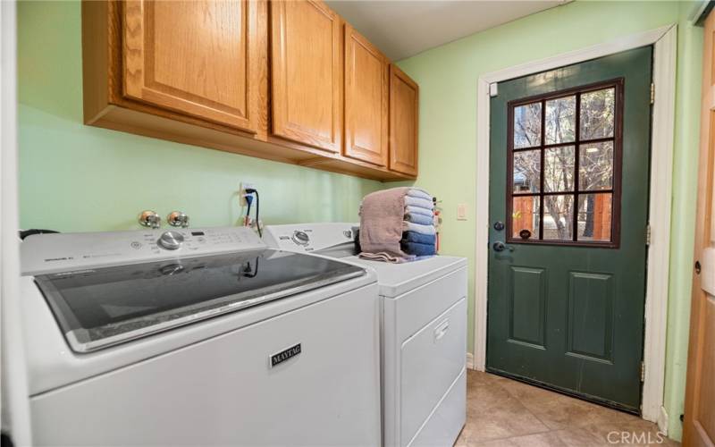 Separate laundry room which opens to the back yard.