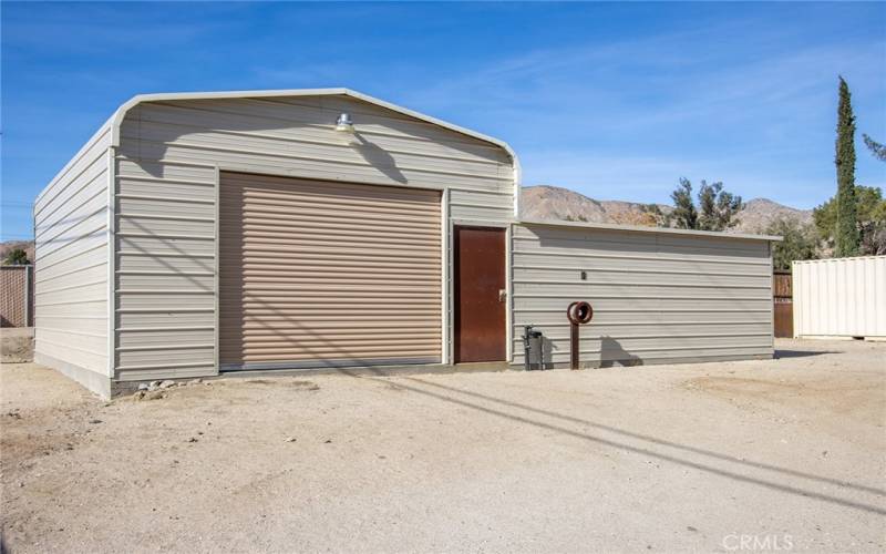 Oversized garage and work shop.