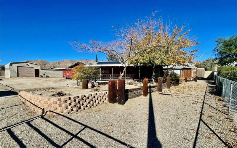 Large lot, fenced, with a garage/work shop that will blow your mind.