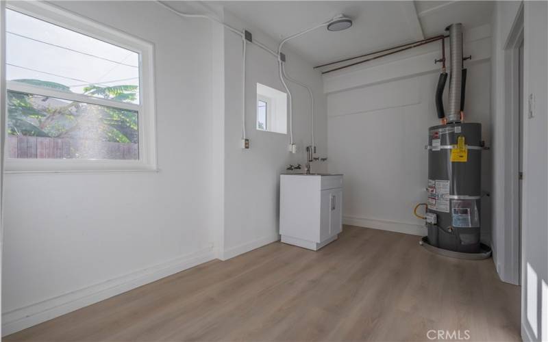 Laundry room in the back of the garage.