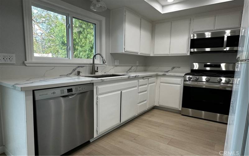 Brand new appliances and sink in the kitchen