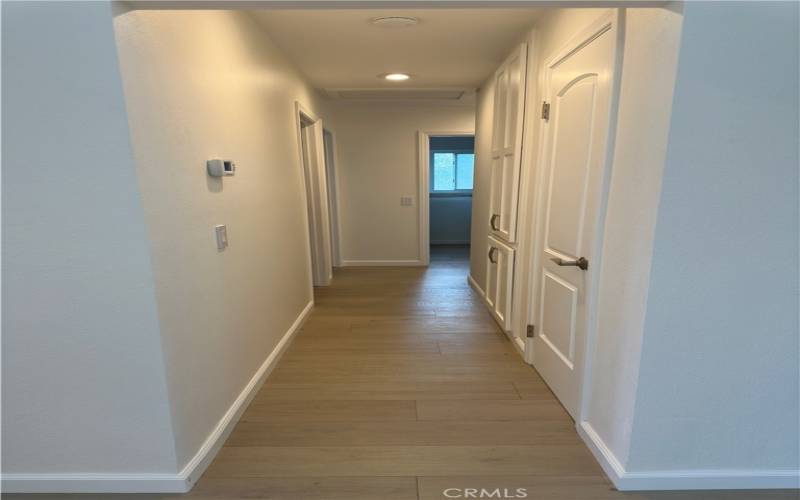 Hallway leading to bedrooms and bathrooms
