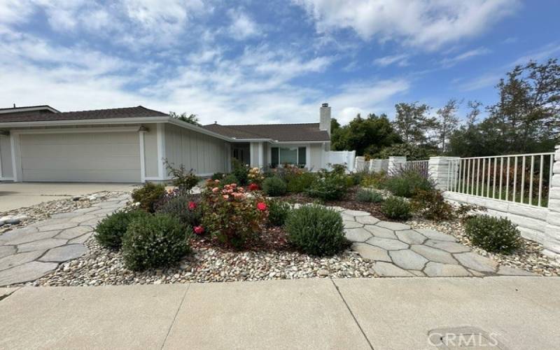 Front of home - landscaping on left side