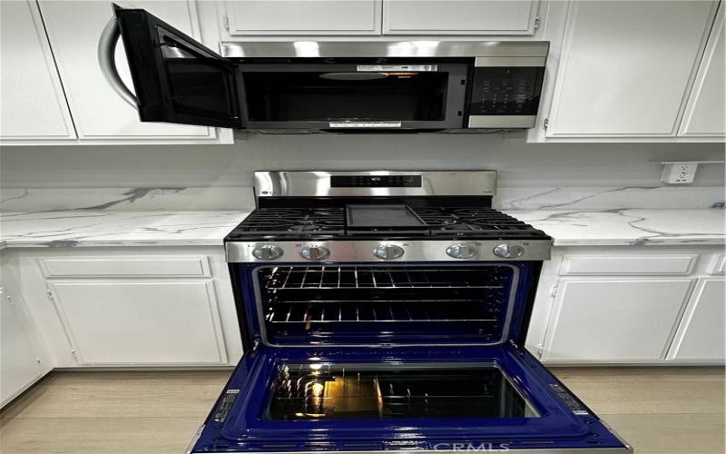 Brand new open microwave, stove, convection oven and range