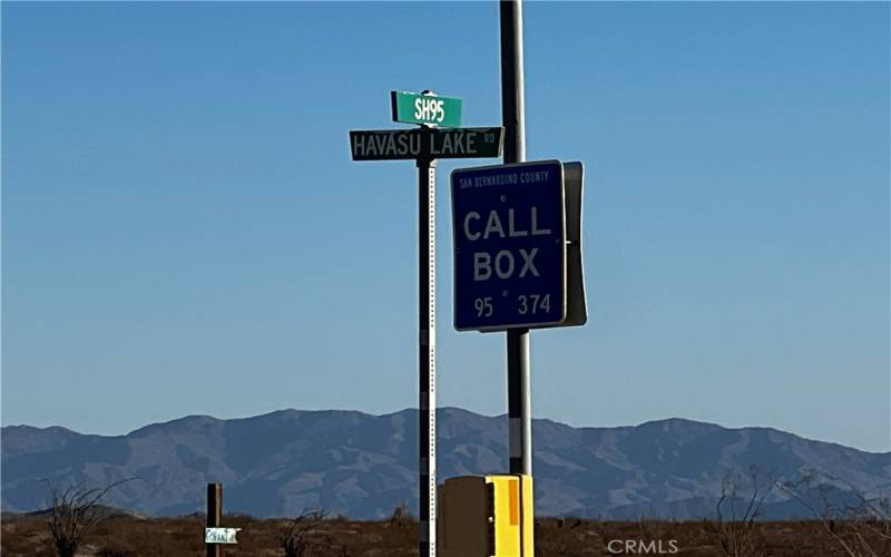 Sign at the entrance road that goes to the property