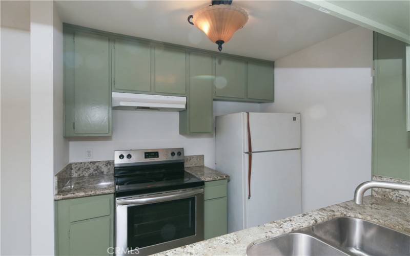 Kitchen with stove & refrigerator