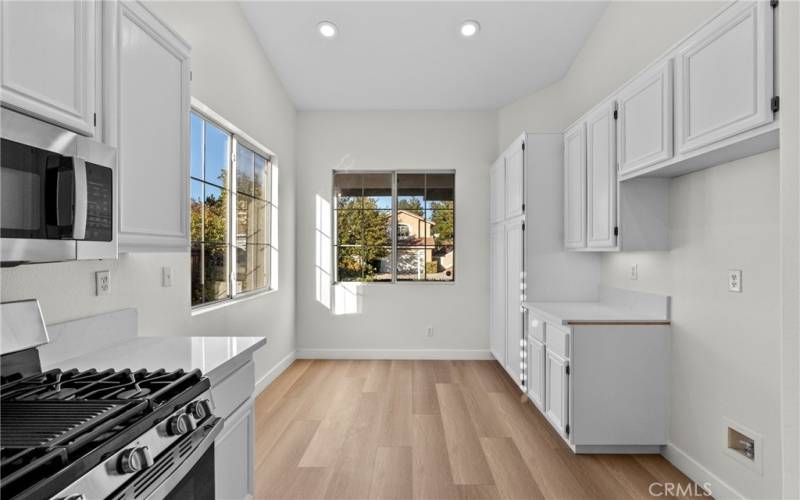 Eat in Kitchen and views of your front porch and newly landscaped front yard