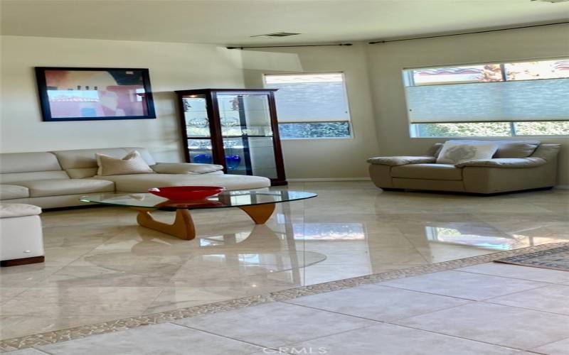 Living Room with beautiful marble flooring.