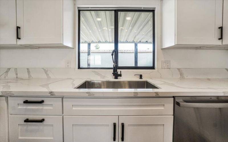 New sink with view of patio