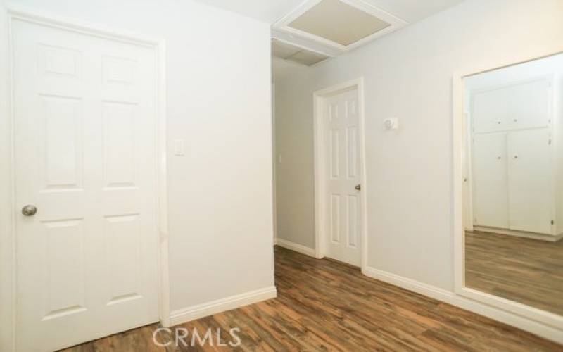 Hallway view to the social bathroom and bedrooms