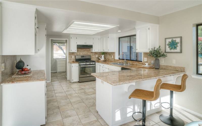 Beautiful kitchen, freshly painted.  Nice granite counter and finishes