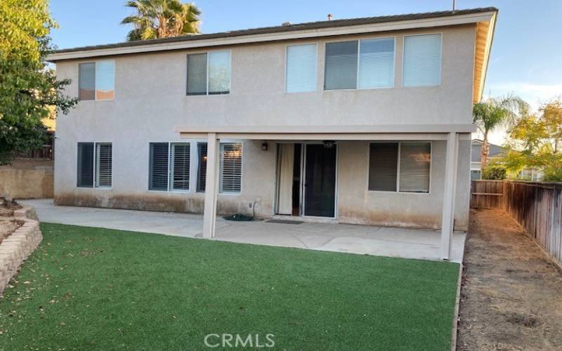 Rear Yard With Covered Patio and Turf