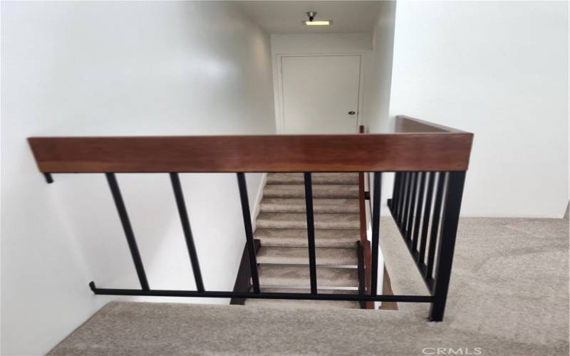 View from bedroom loft to stairs