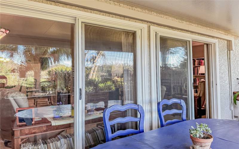 OPEN PATIO WITH SLIDING DOORS TO THE LIVING ROOM