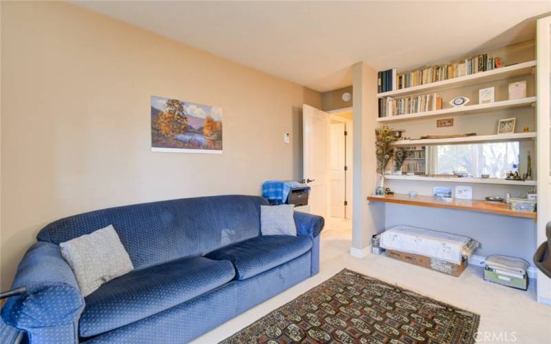 GUEST BEDROOM BOOK SHELVES & DOOR TO HALL