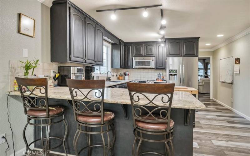 Breakfast Bar (Down the leads to Family Room)