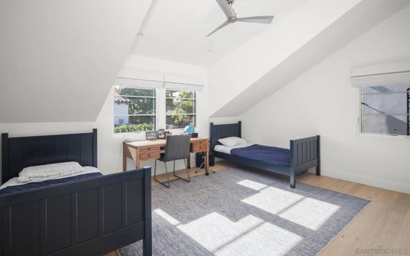 Upstairs bedroom with 2 twin beds. Hall bathroom (shared with one other bedroom).