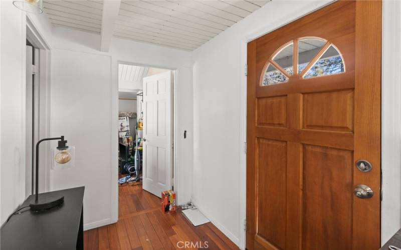 Entry with view to first floor bedroom main bath on left.