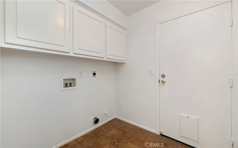 Laundry Room with plenty of Cabinets