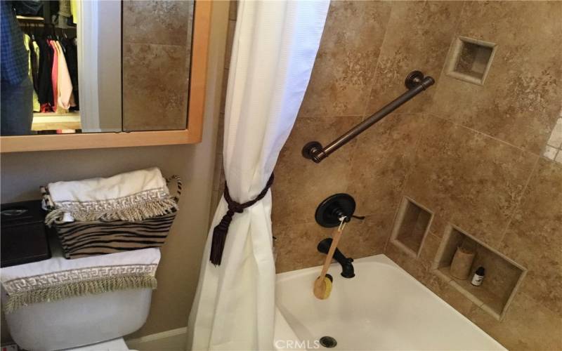 Bathtub and tile shower in master bath