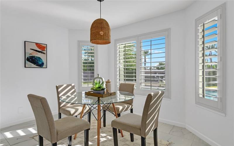 Our kitchen flows seamlessly into the breakfast nook, where we can start our day off right. Whether we're enjoying a quiet morning or hosting friends for brunch, this space is the perfect place to gather over a delicious meal.