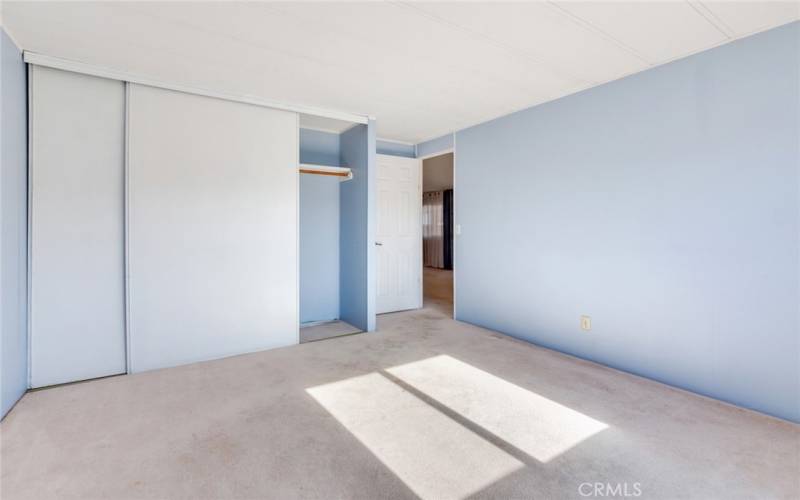 Bedroom #3 Entry with Panel Sliding Closet Doors