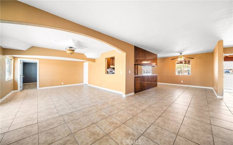 Open concept living room to dining & family room