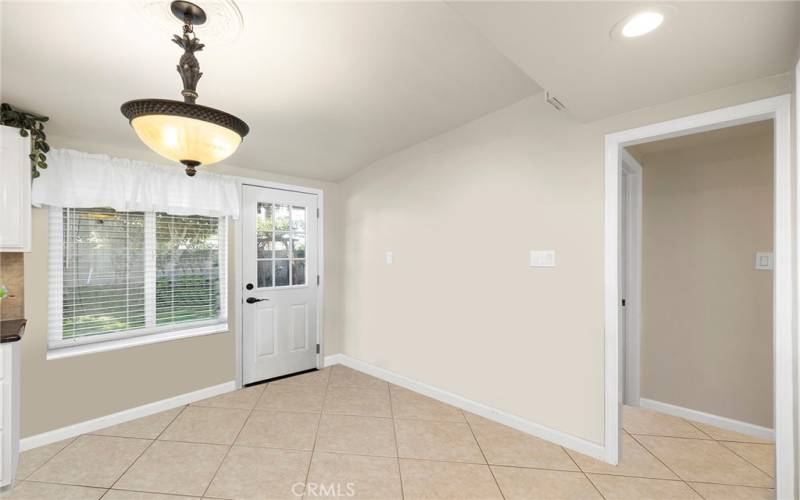 DINING AREA WITH DOOR TO BACKYARD