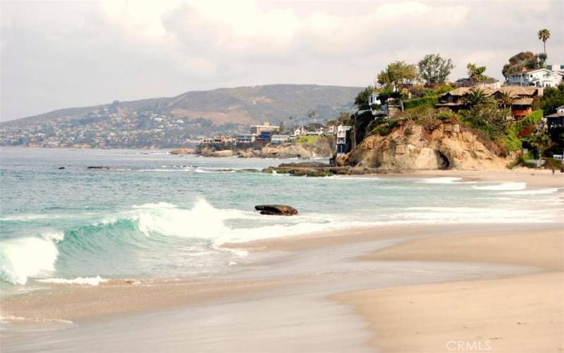 VIEW FROM BLUE LAGOON BEACH LOOKING TOWARDS VICTORIA BEACH AND DOWNTOWN LAGUNA