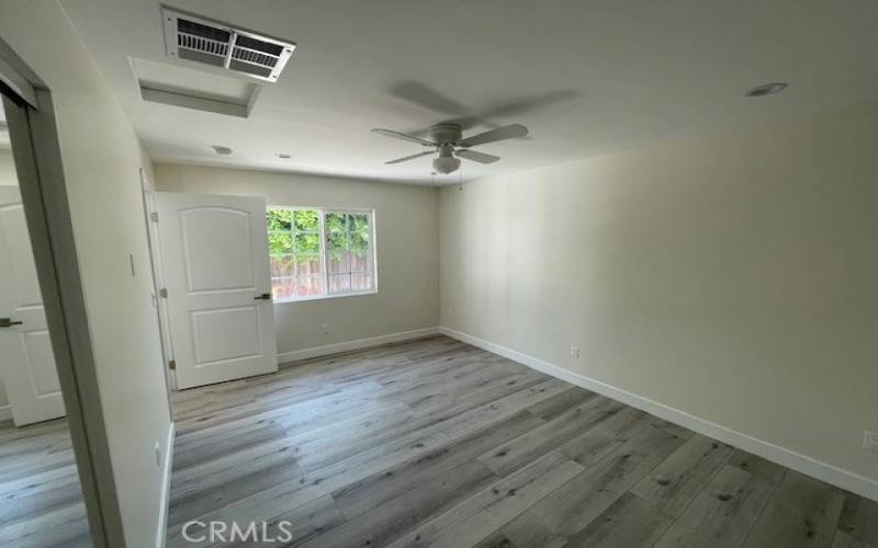 Private bedroom with ceiling fan