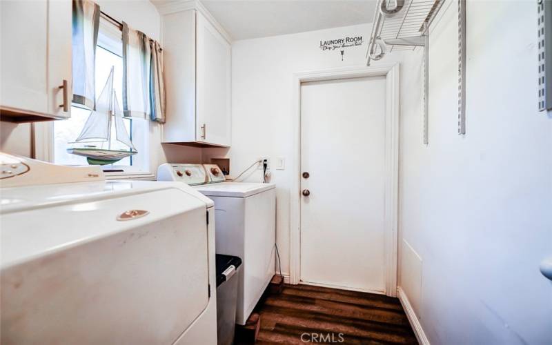 Laundry Room and entrance door to garage