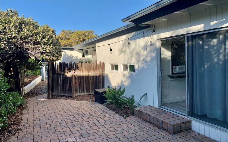 Enclosed yard, patio and side yard.