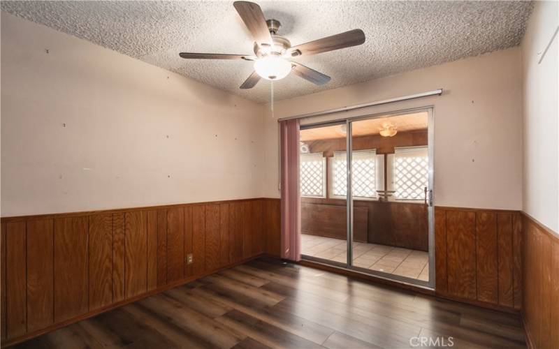 Front Bedroom with Slider to Lanai & Ceiling Fan Light Fixture