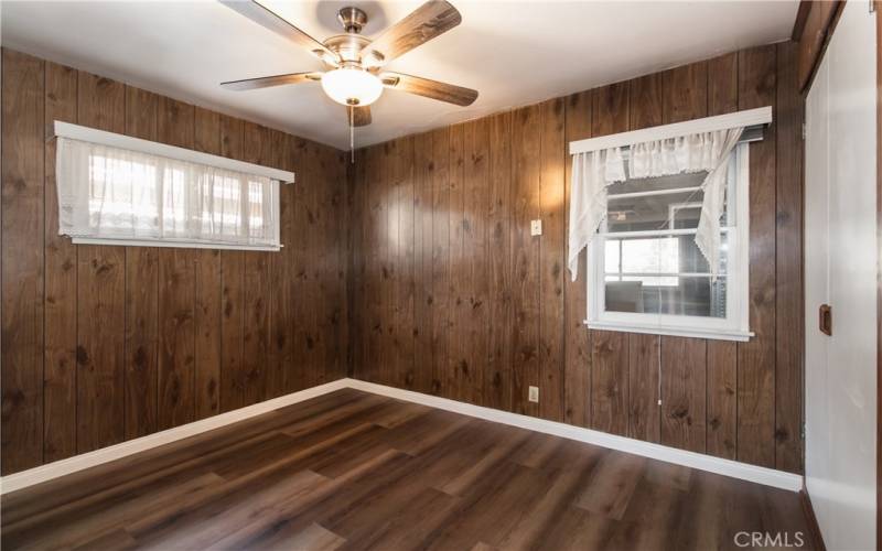 Rear Bedroom With Wood Paneling, Ceiling Fan Light Fixture