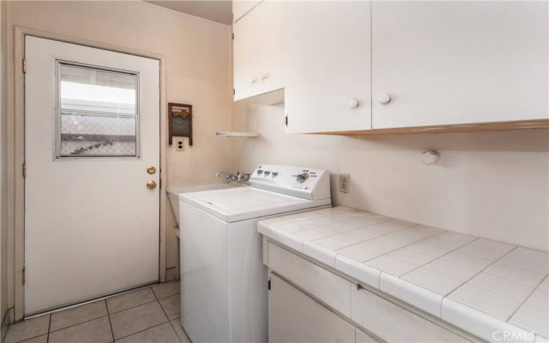 Convenient Laundry Room & Exit to Backyard