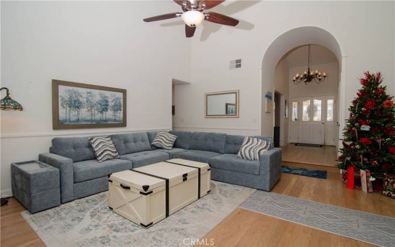 Living room / cathedral ceiling and fan