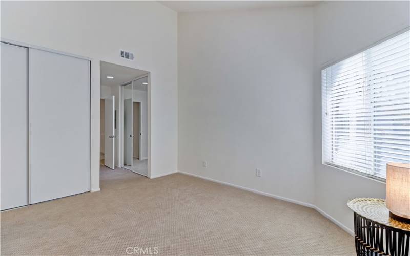 Second portion of Primary 1 Bedroom with two separate closet areas and bathroom en suite.